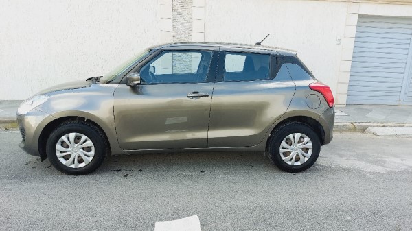 Suzuki Swift avec vitres électriques
